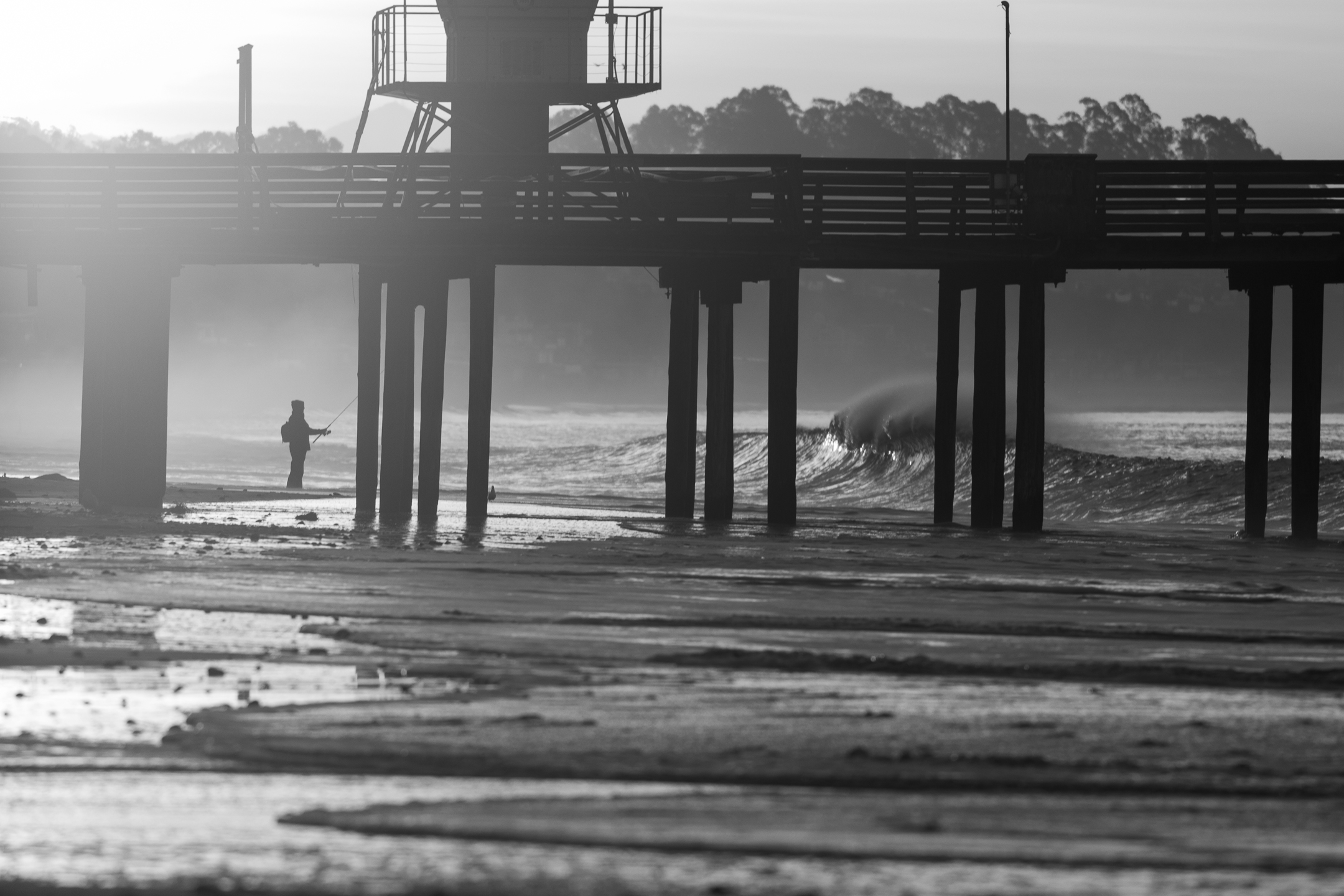 Fisherman and Wharf with wave in morning light